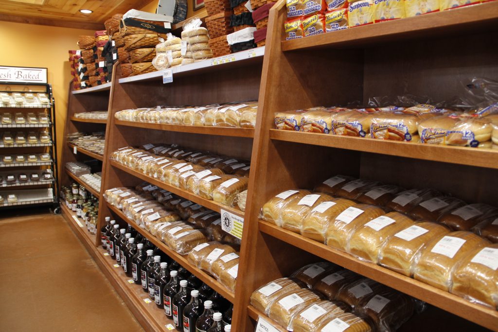 Shelves filled with fresh bread.
